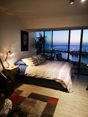Vista completa al mar desde la misma cama. Costado Mall centro